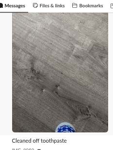 Slack post: photo of a bathroom sink with caption 'Cleaned off toothpaste'